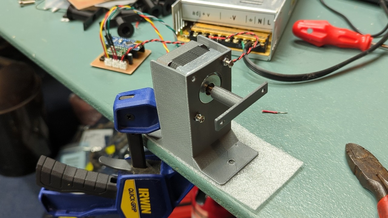 The stepper motor and shaft adapter sit idle, waiting for the next solenoid to be attached