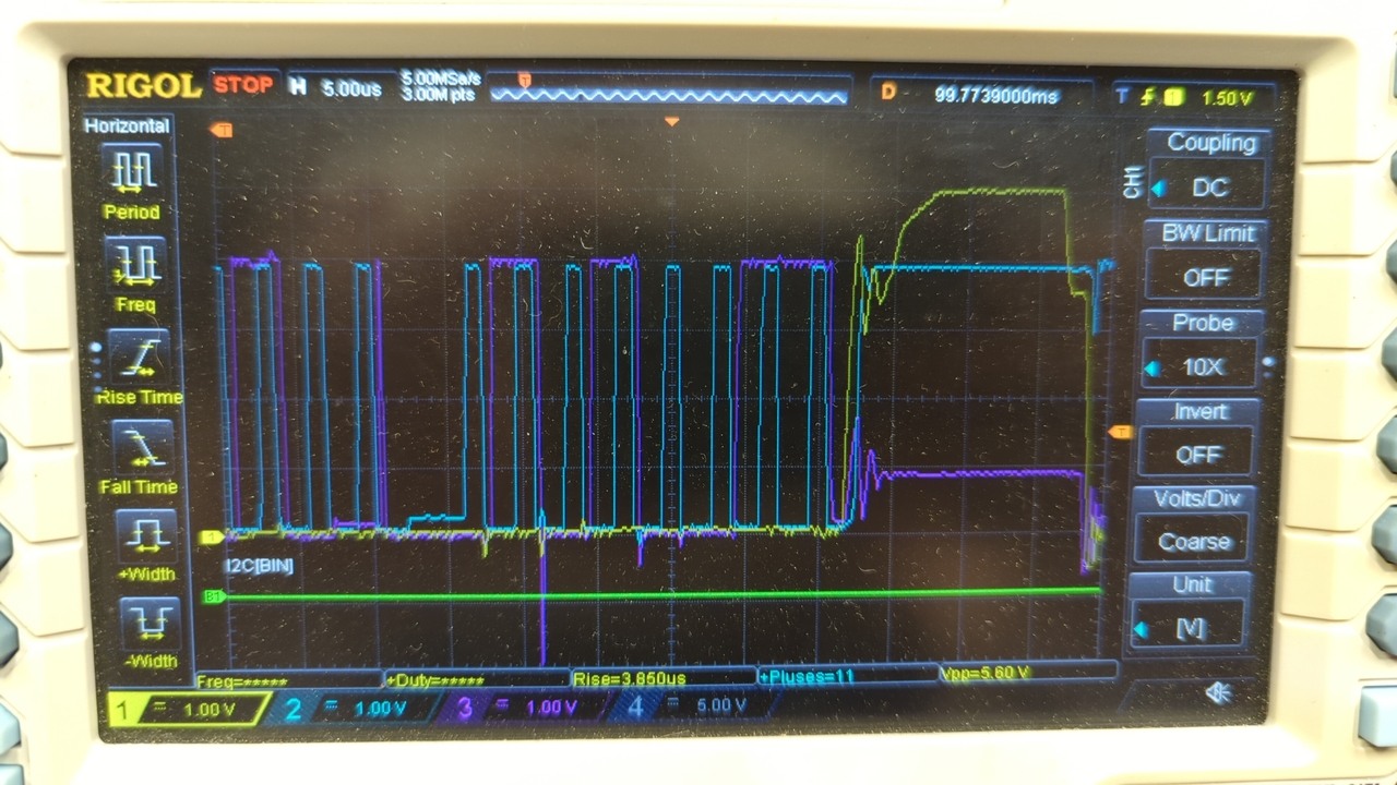 Oscilloscope display showing I2C traffic in purple and blue and solenoid activity in yellow. The yellow trace is causing noise in the purple trace due to a positive-going transition.