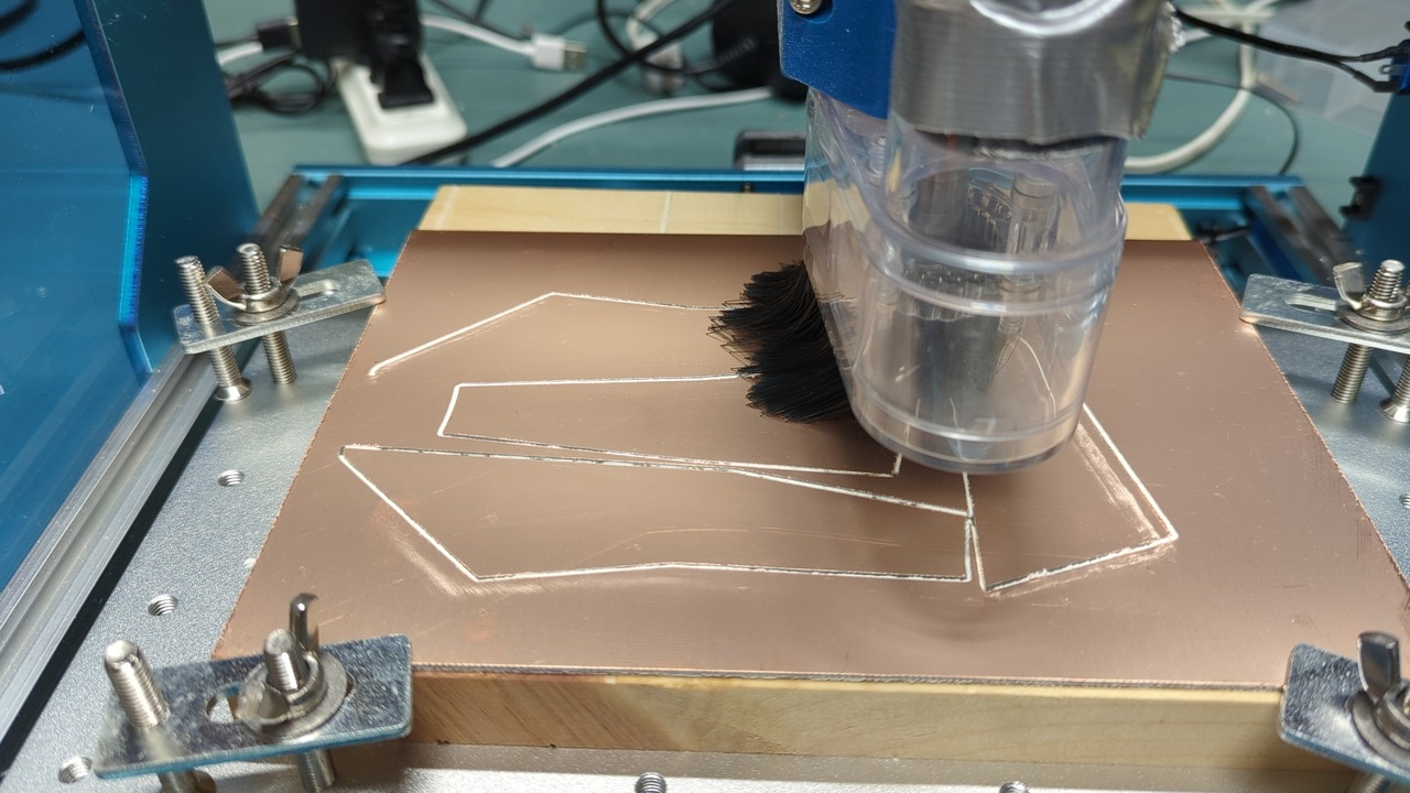 My CNC mill cutting some of the parts with the dust shoe installed